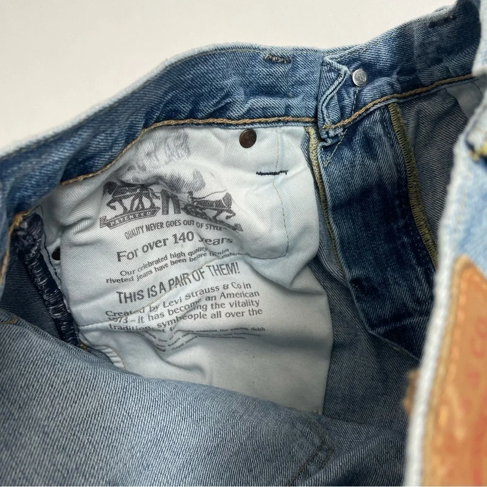 LEVI’S 511 distressed jeans
